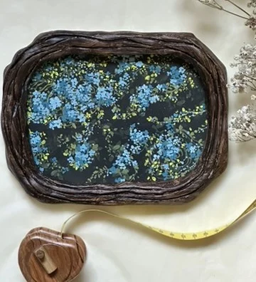 Blue Blossoms. Gouache on paper · Hand-carved frame, artist's own